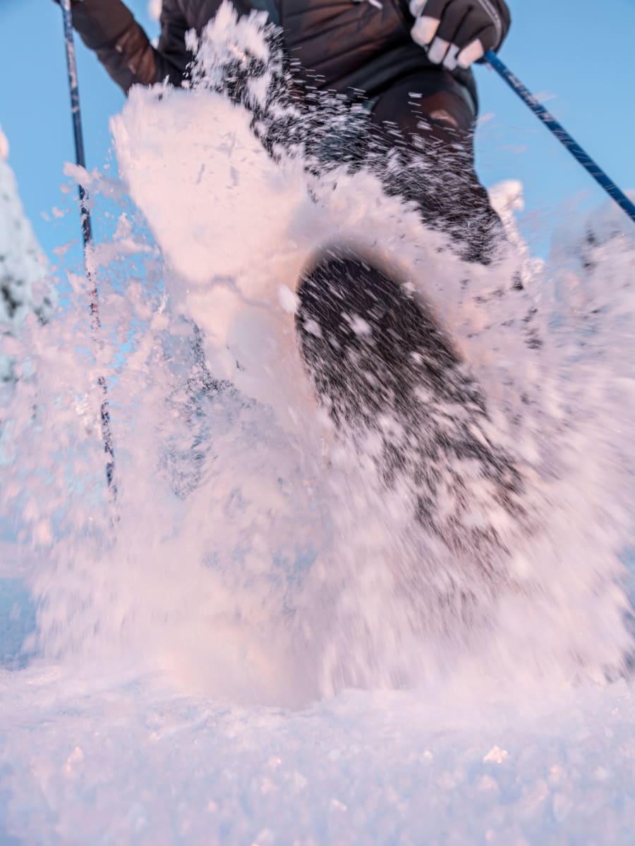 Aavasaksa in Finland - a person is skiing down a snowy hill.