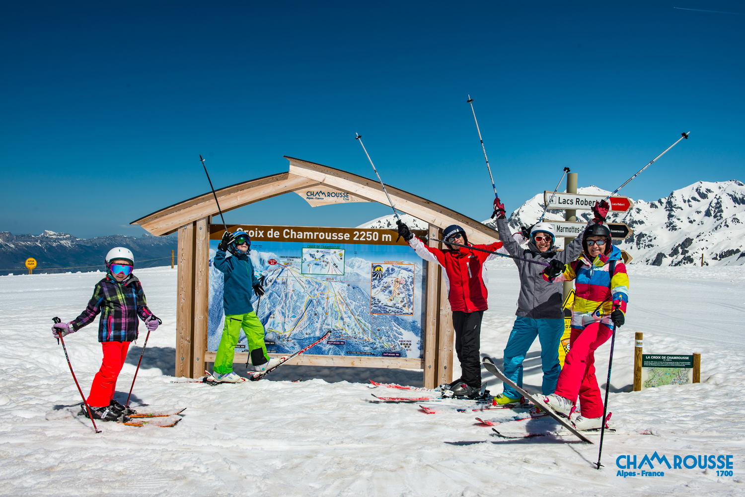 Chamrousse in France - a group of skiers posing for a picture.