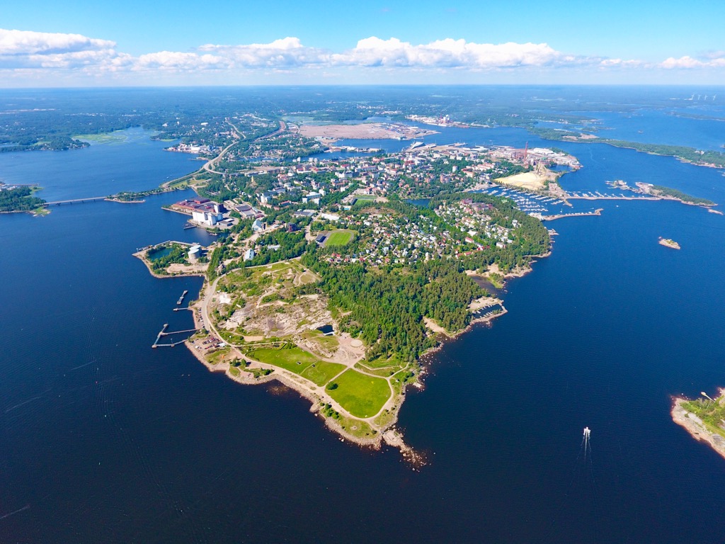 Uuperin rinteet in Finland - an aerial view of a small island in the middle of a lake.