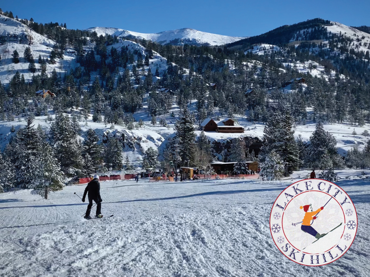 Lake City Ski Hill in USA - a person is skiing down a snowy hill.