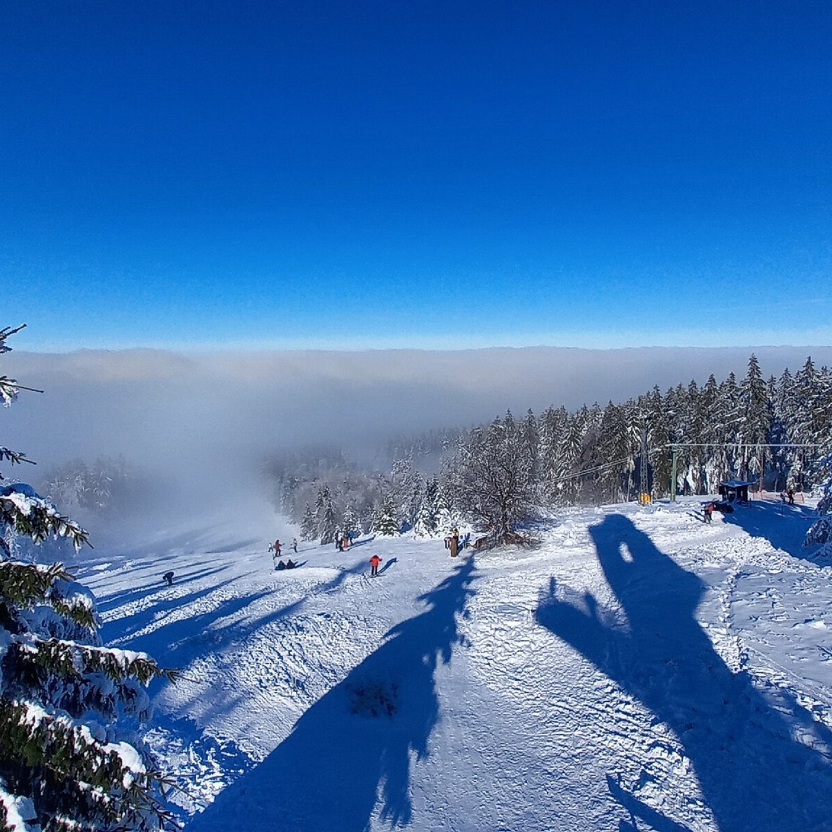 Erbeskopf in Germany - a view from the top of a snowy mountain.