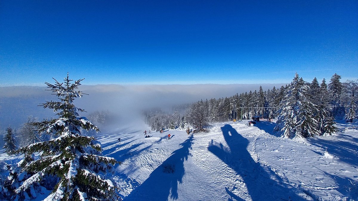 Erbeskopf in Germany - a view from the top of a snowy mountain.