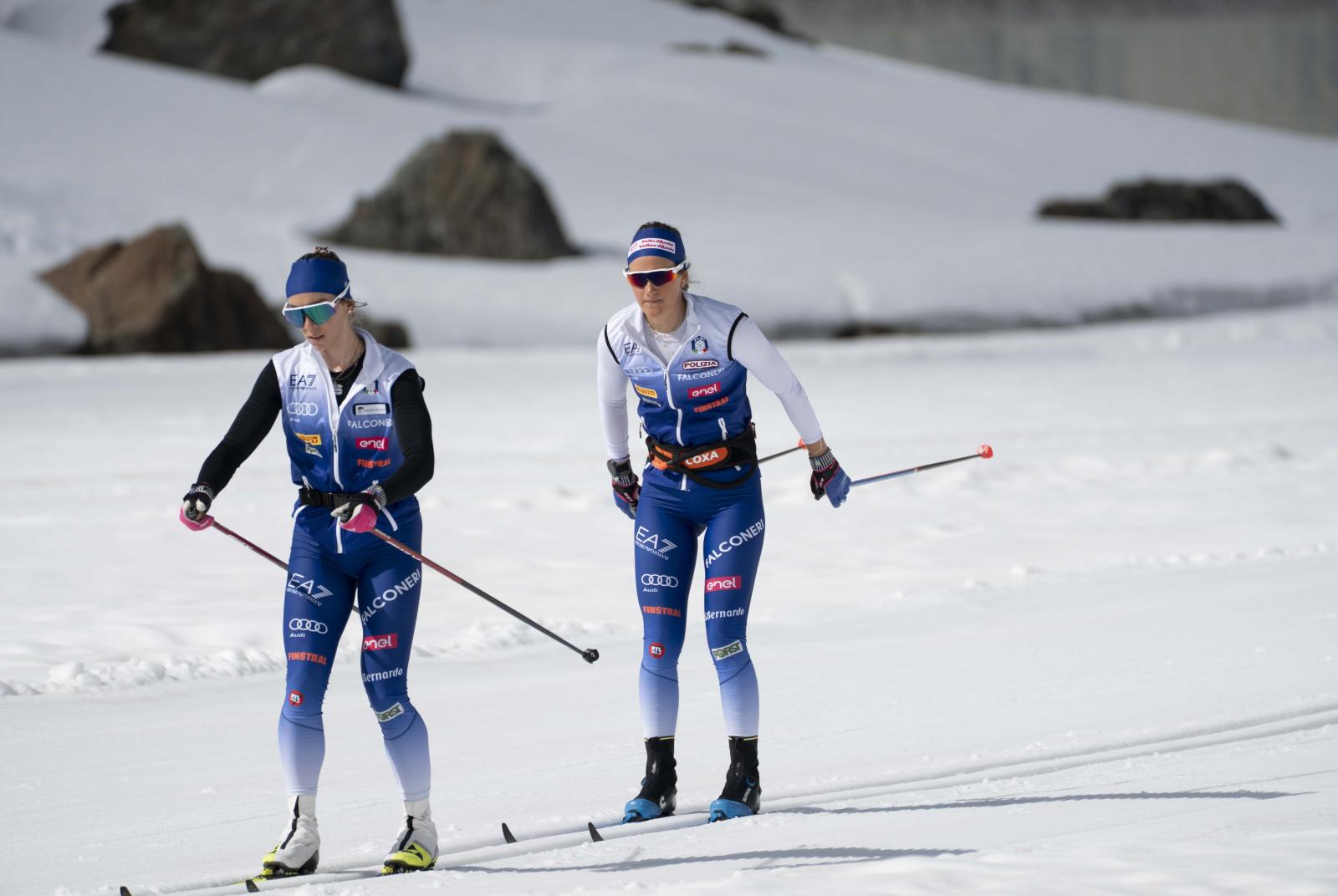 Gopshusbacken in Sweden - two people are skiing down a snowy hill.