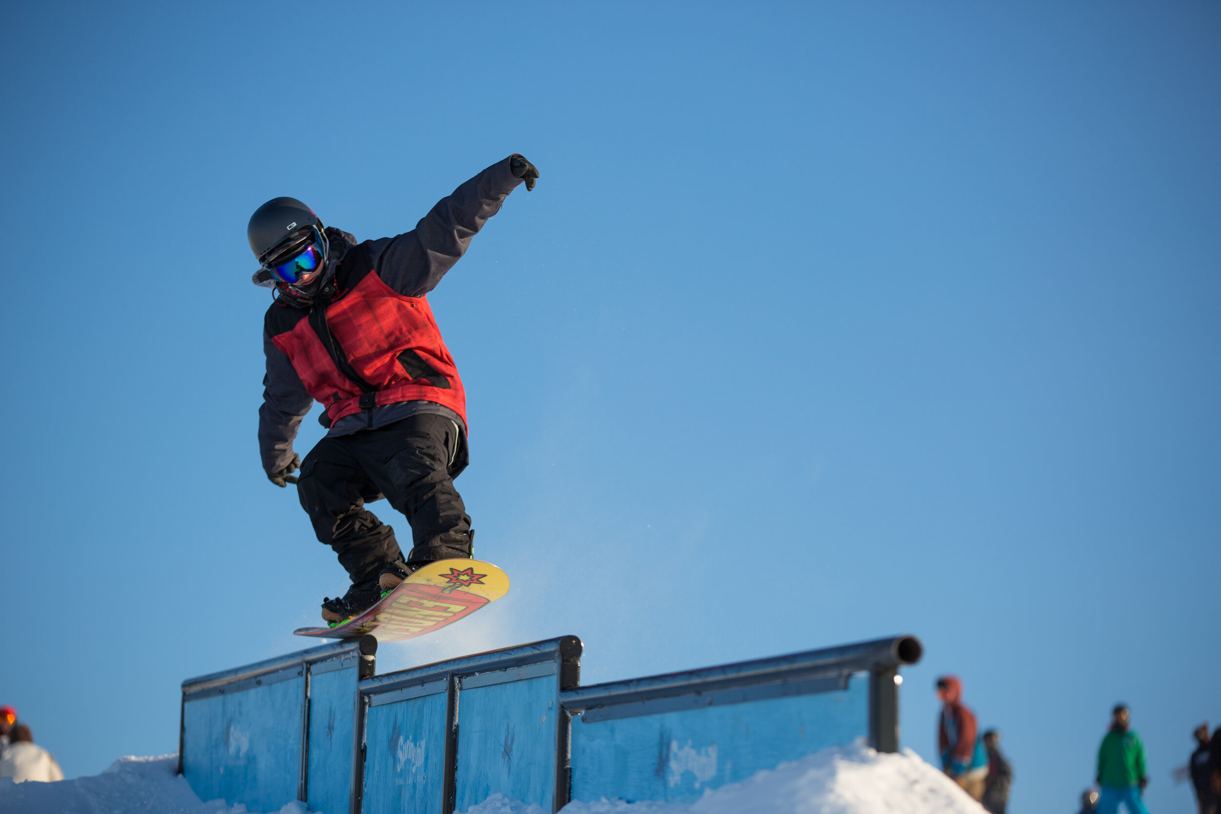 Spring Hill Winter Park in Canada - a person on a snowboard doing a trick.
