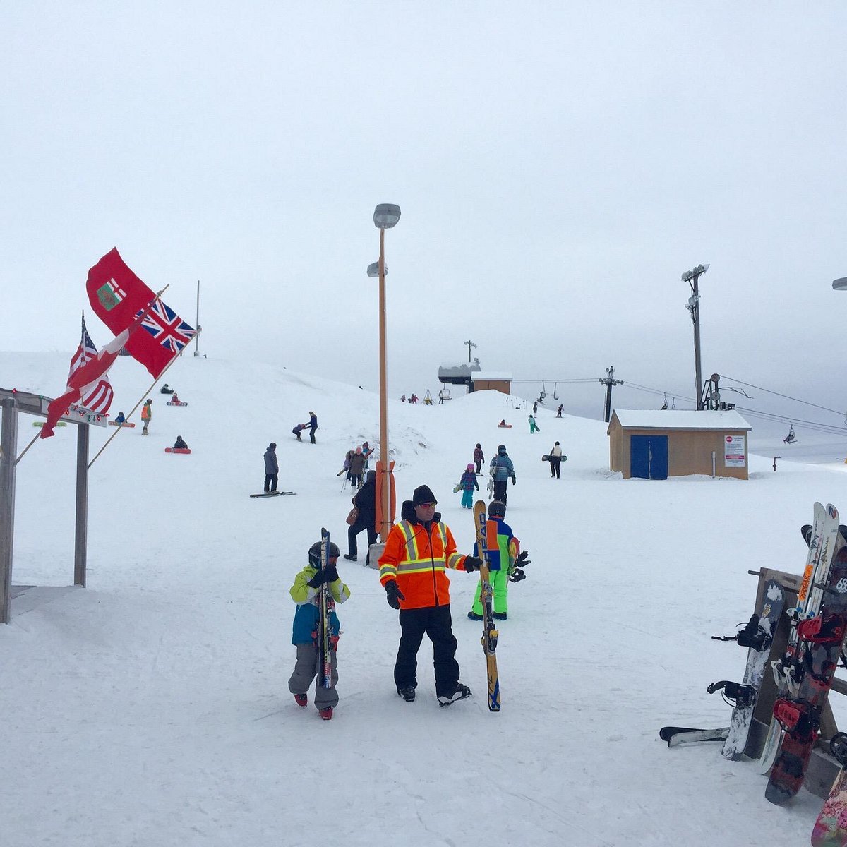 Spring Hill Winter Park in Canada - a group of people standing on top of a ski slope.