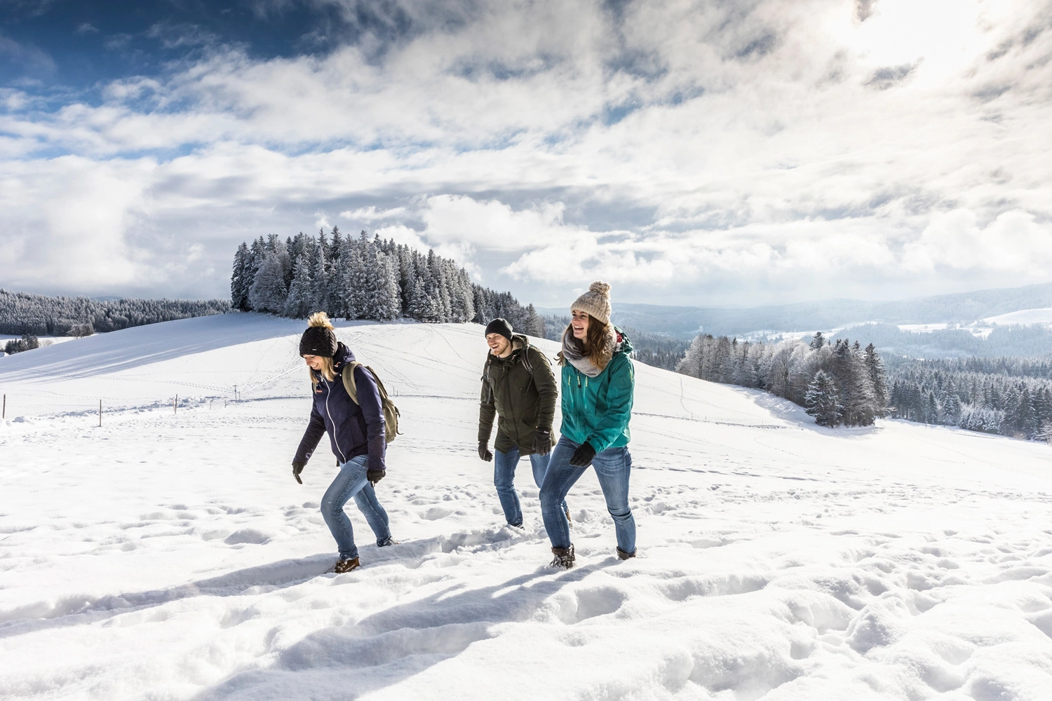 Hornlift – Fröhnd in Germany - two people walking in the snow on a mountain.