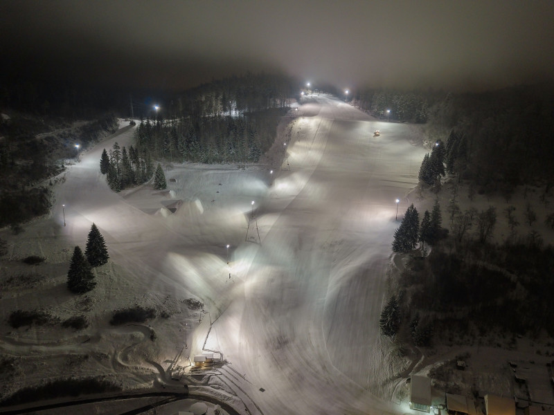 Schlossberg – Albstadt-Tailfingen in Germany - a view of a ski slope at night.