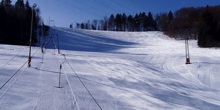Schlossberg – Albstadt-Tailfingen in Germany - a ski slope with trees in the background.