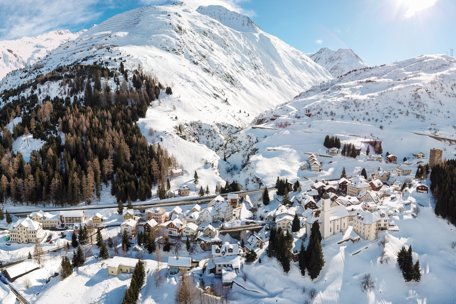 Gemsstock – Andermatt in Switzerland - a view of a snowy town in the mountains.