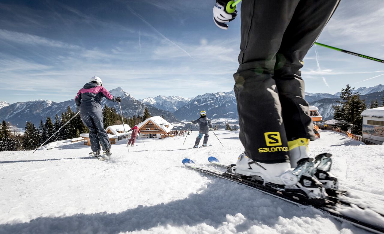 Hoch-Imst – Imst in Austria - a group of people skiing down a mountain.