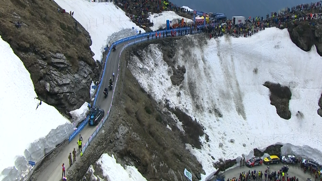 Colle de Lys in Italy - a group of people standing on top of a mountain.