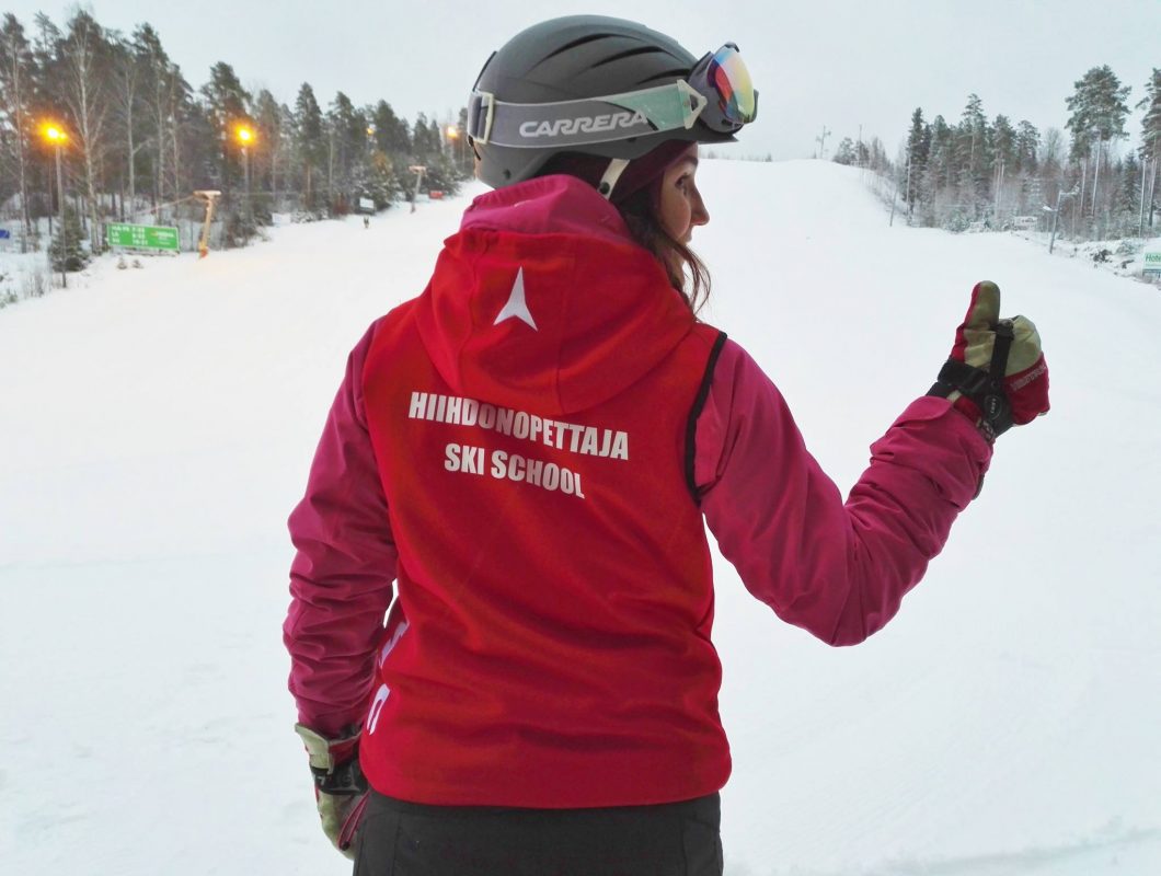 Tornimäki – Mikkeli in Finland - a woman wearing a red jacket.