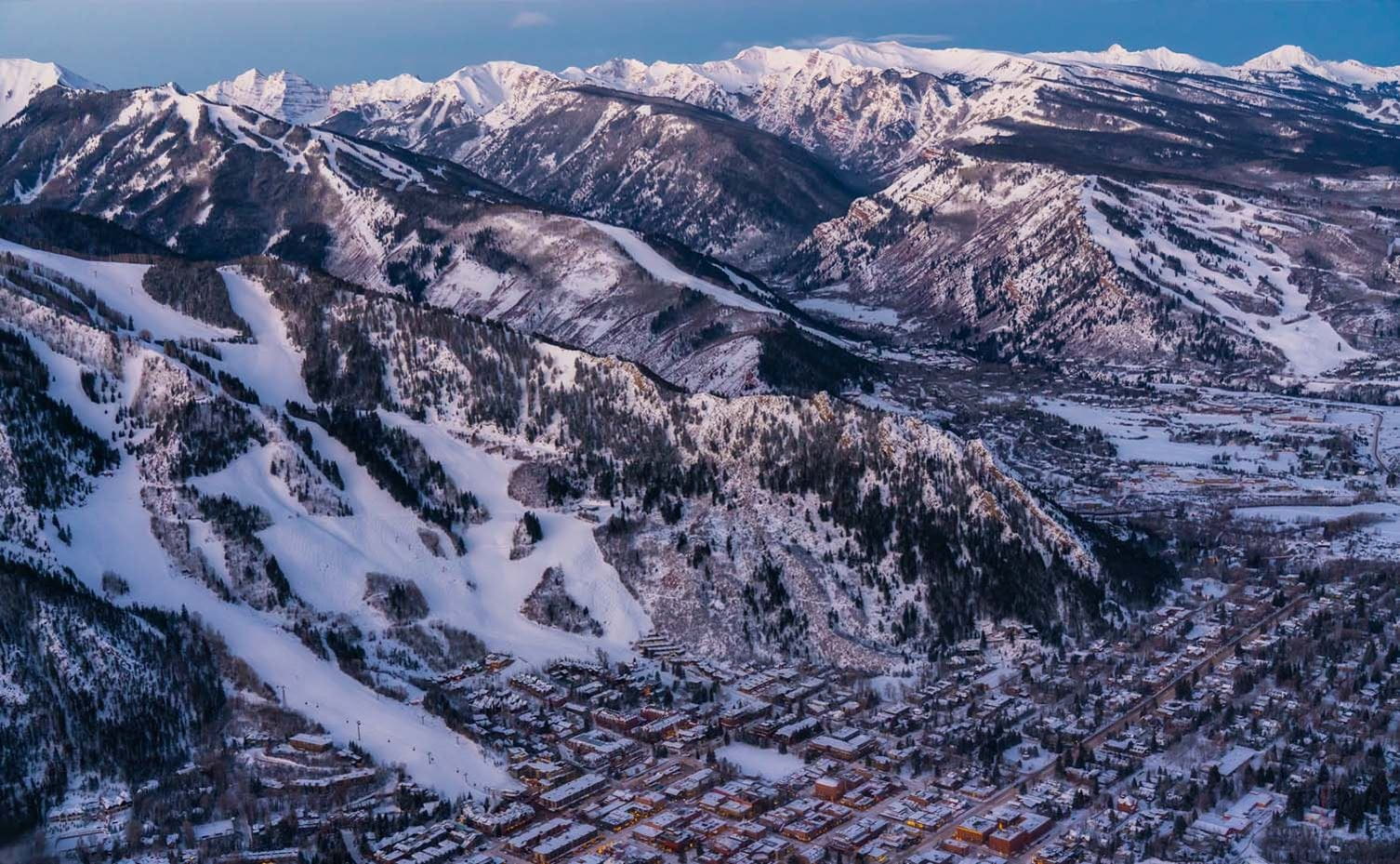 Aspen Mountain in USA - an aerial view of the town and mountains in winter.