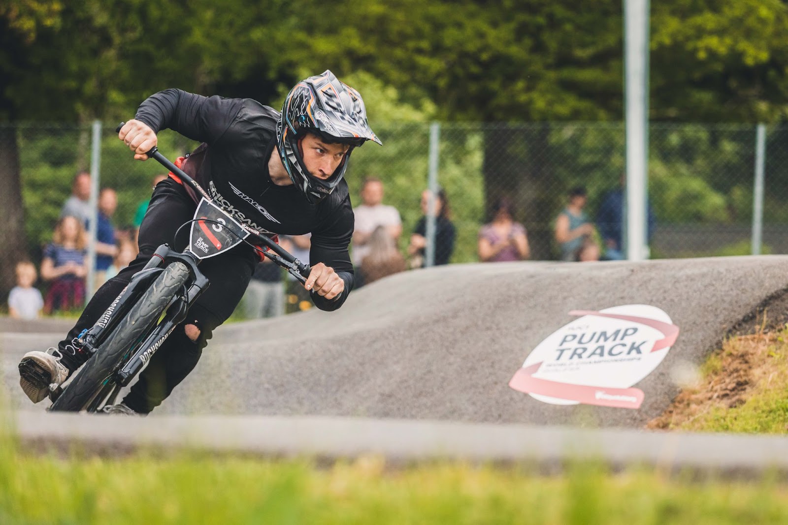 HEIpark Tošovice in Czech Republic - a man riding a bike on top of a ramp.