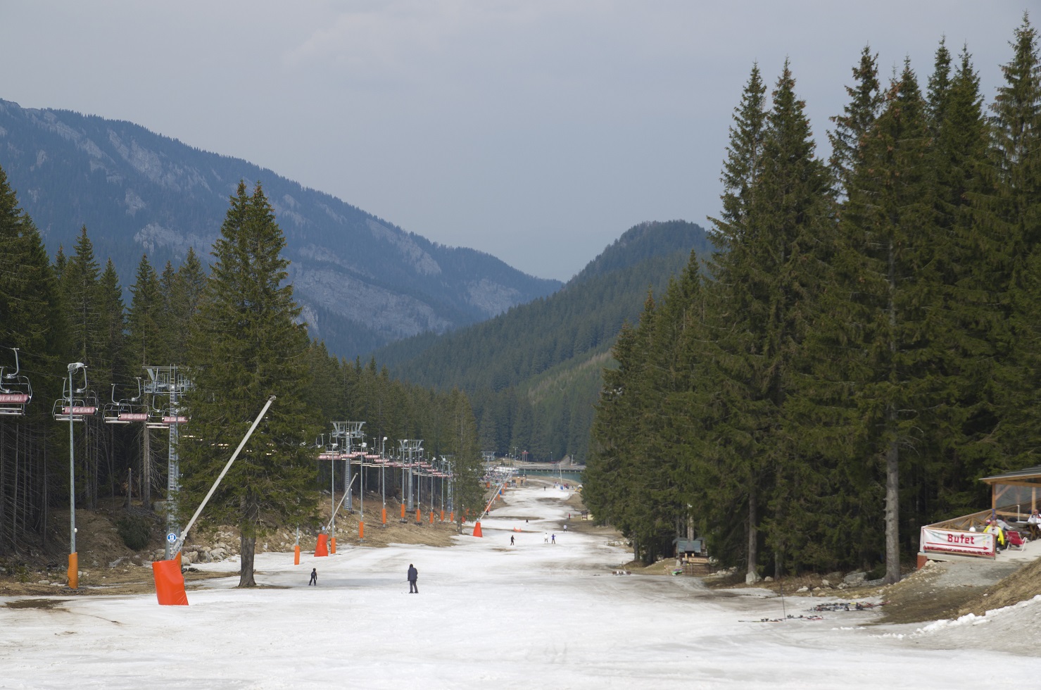 Zebra – Białka Tatrzańska in Poland - a person walking down a snow covered road.