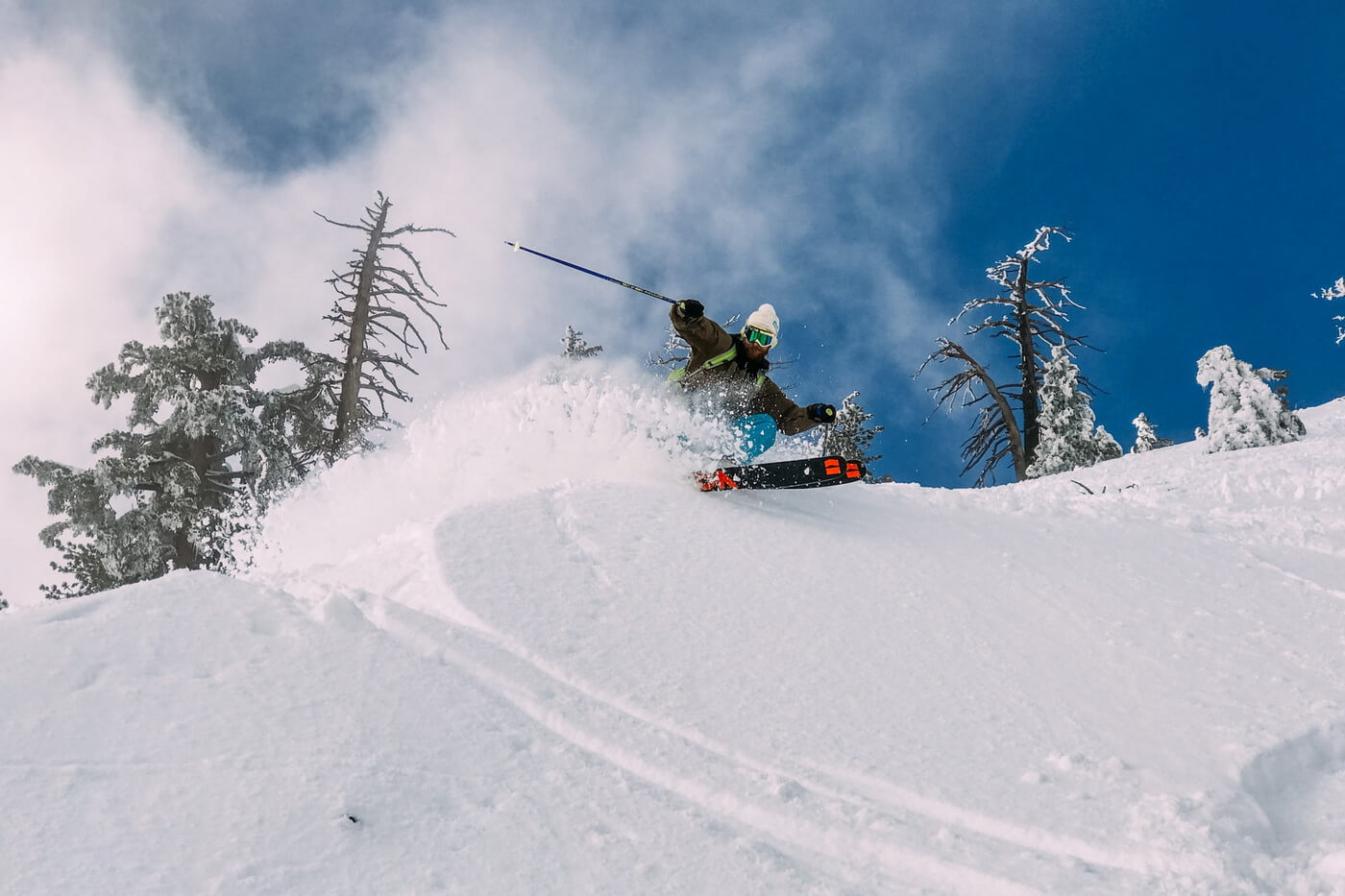 Goč – Banjskoj strani in Serbia - a person is skiing down a snowy hill.