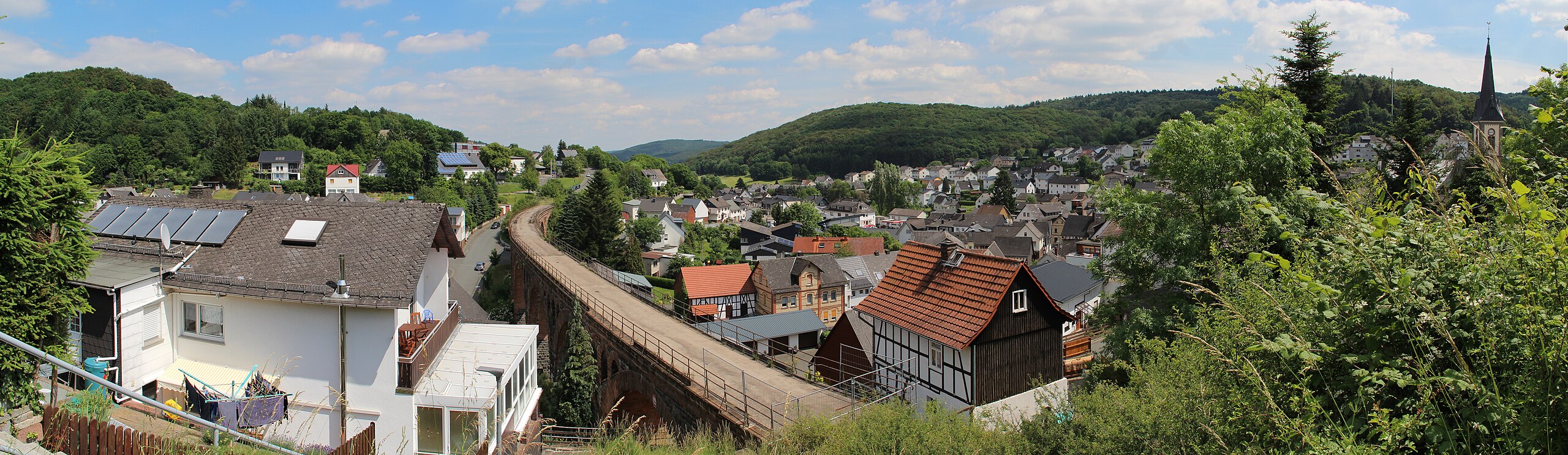 Hartenrod in Germany - a view of a small town from a hill.