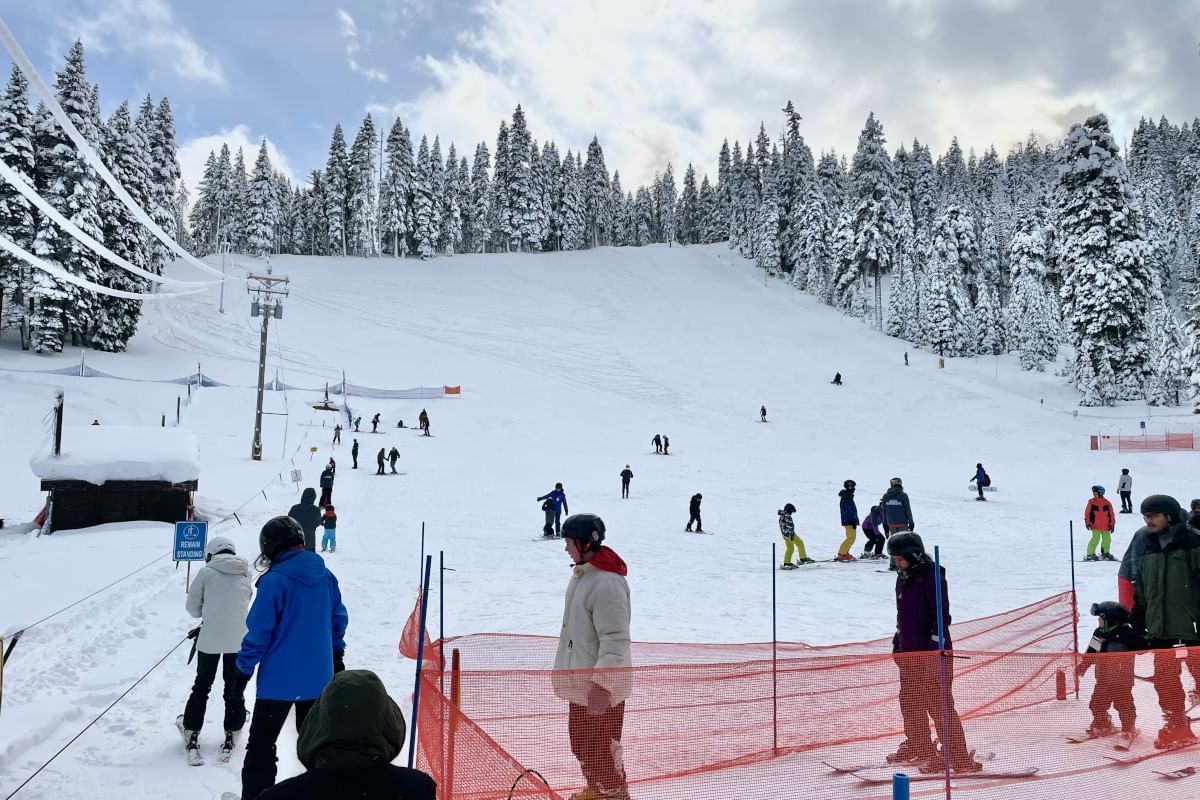 Granlibakken in USA - a group of people skiing down a snow covered slope.