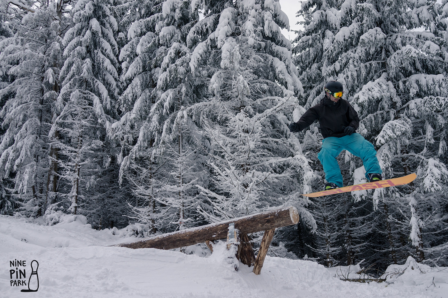 Kegelberg – Erlbach in Germany - a person jumping in the air on a snowboard.