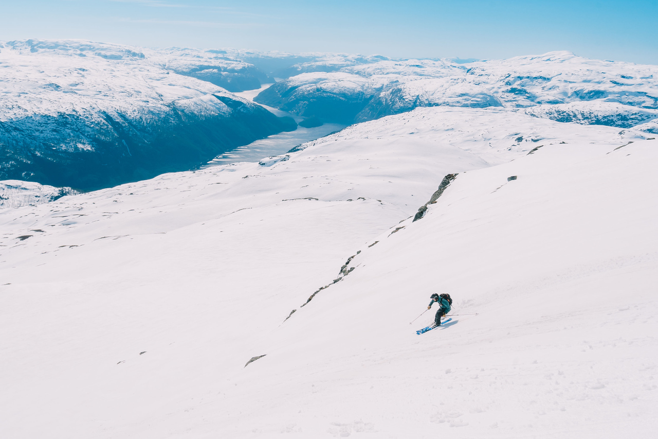 Gullingen in Norway - a person skiing down a snow covered mountain.