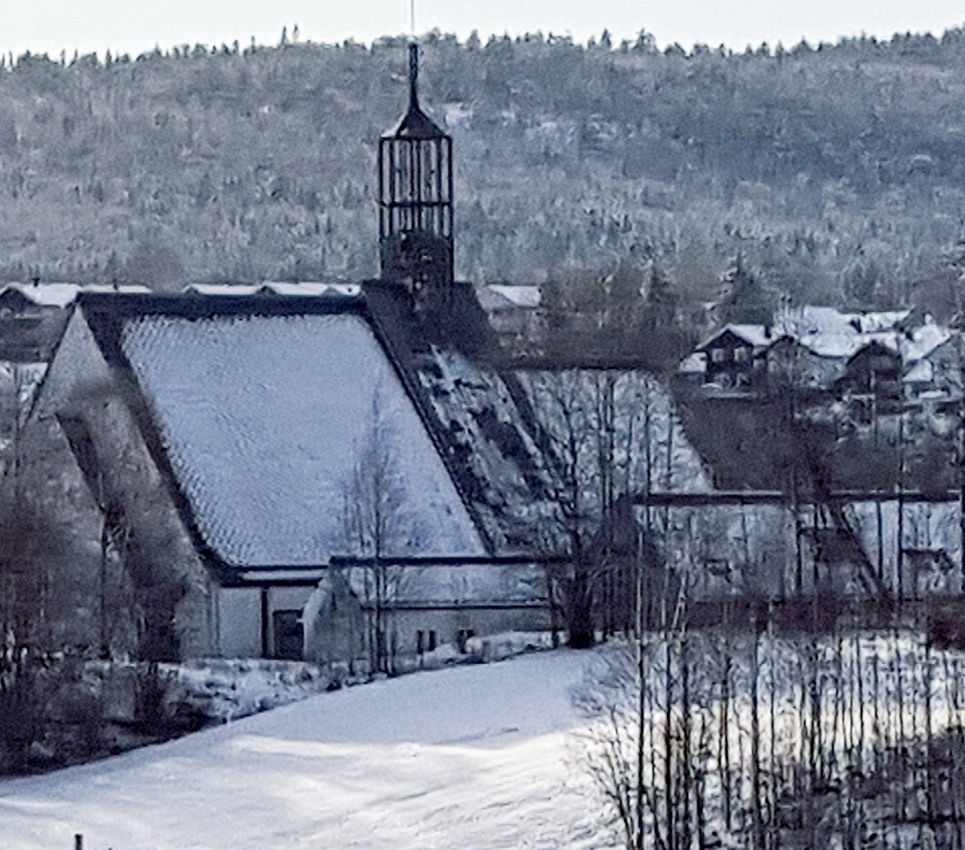 Lommedalen in Norway - a view of a small town with a clock tower.