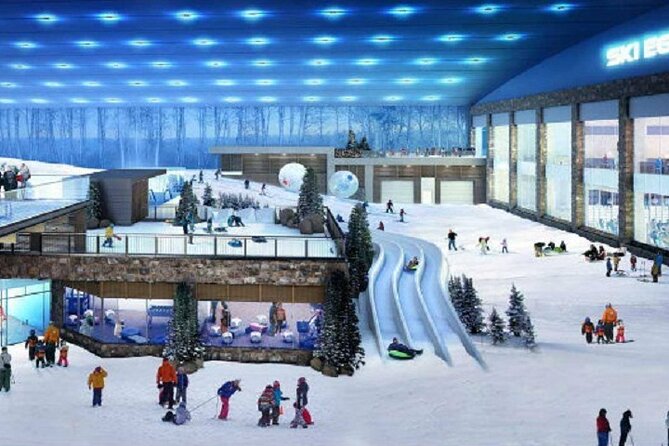 An indoor ski resort in Ski Egypt, featuring lighted slopes, ski equipment, and a taste of winter sports activities, creating a unique snow-filled experience.