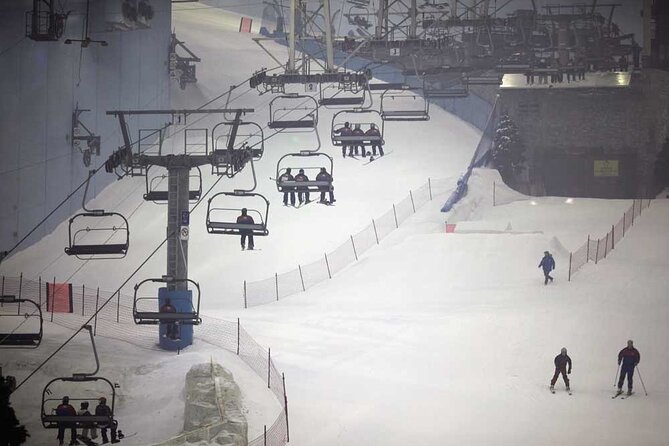 Ski Egypt's interior captures a bustling ski resort scene complete with a ski lift. Enthusiasts are enjoying winter sports in this unique, indoor snow setting.