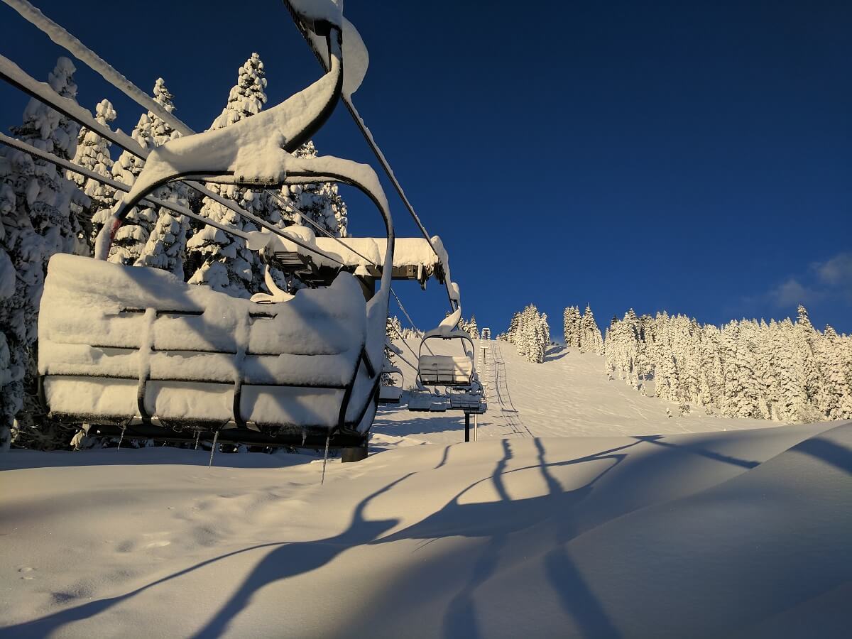 Homewood Mountain Resort in USA - a snow covered ski lift in the snow.