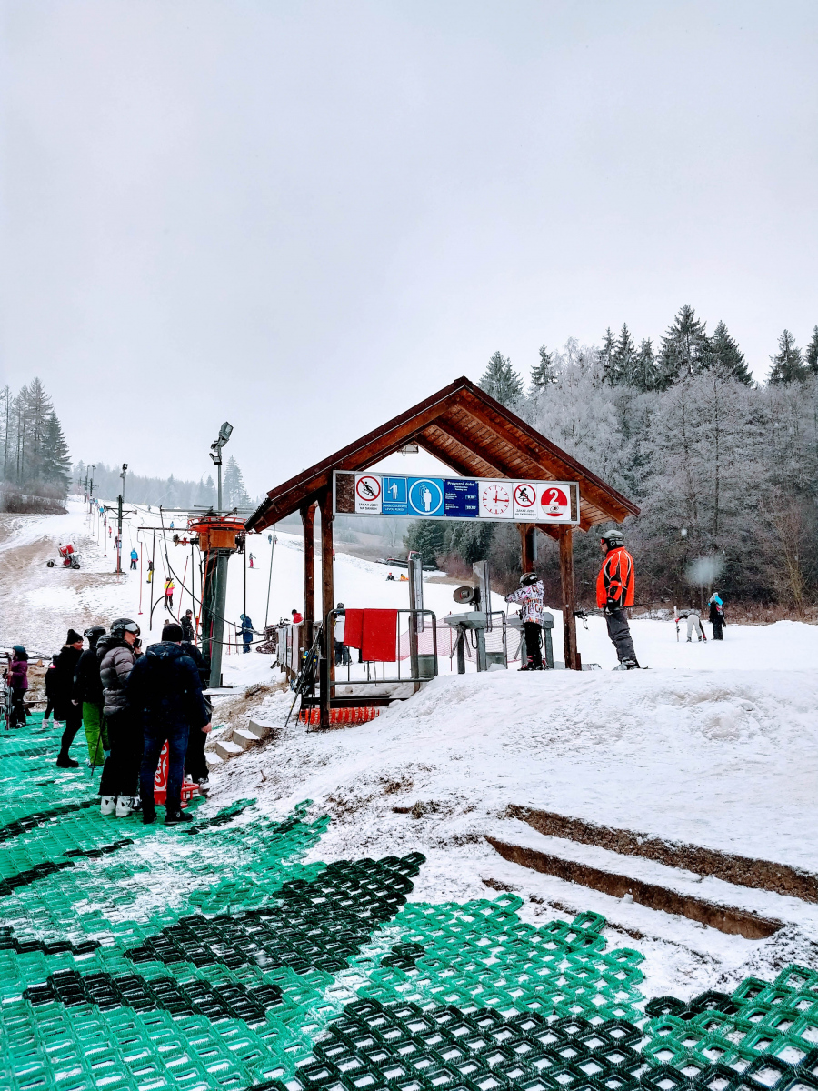 Hodonín u Kunštátu in Czech Republic - a group of people standing on a snow covered ski slope.