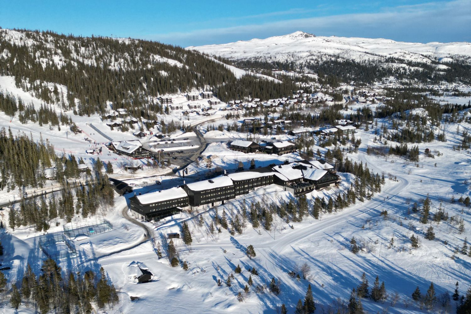 Gaustablikk Fjellresort in Norway: a ski resort surrounded by trees and snow.