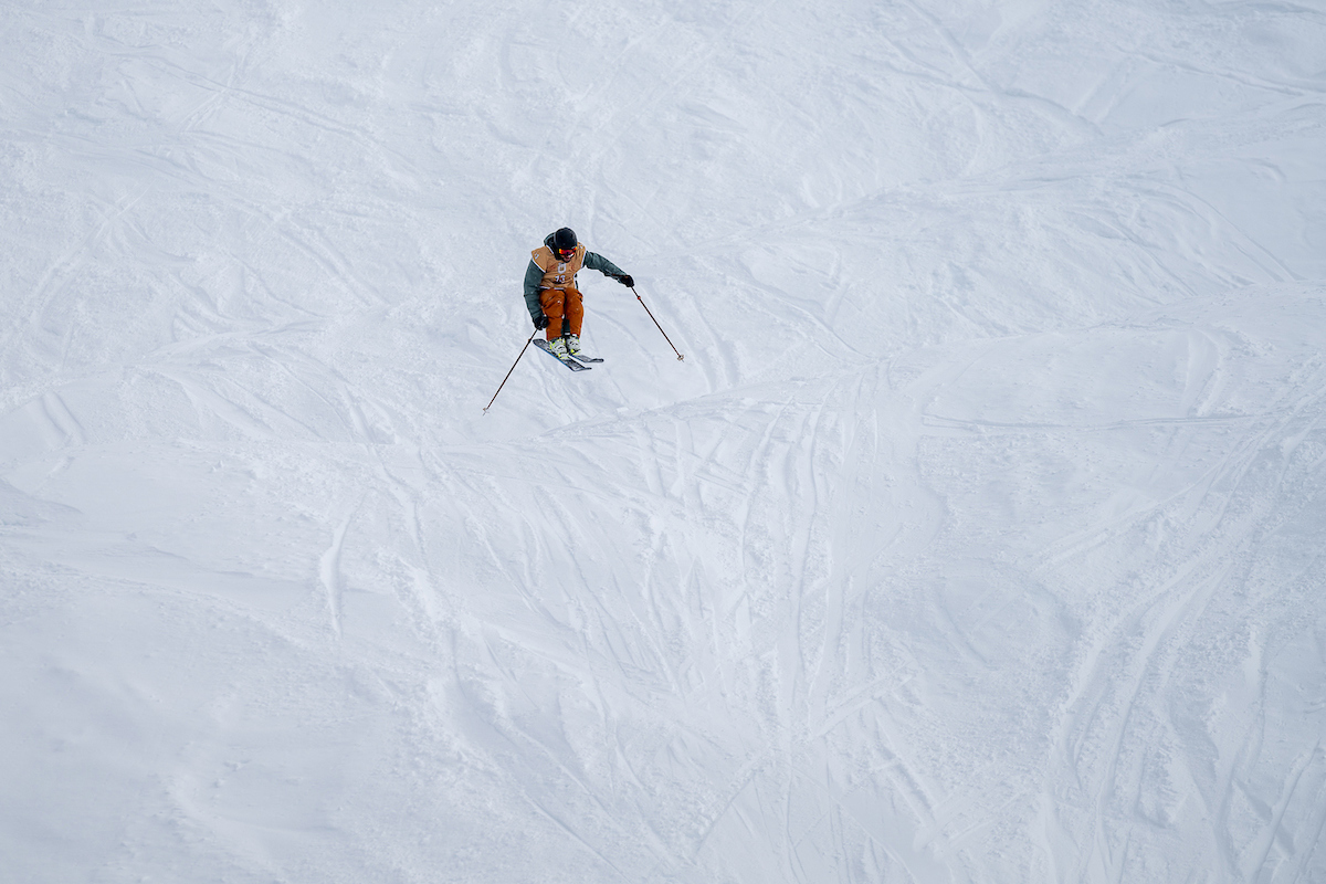 Druni KidsArena – Valtgeva in Switzerland - a man riding skis down a snow covered slope.