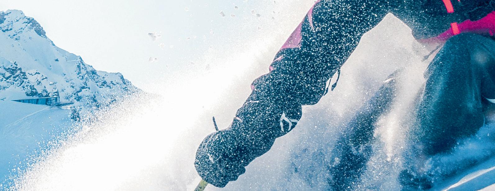 Druni KidsArena – Valtgeva in Switzerland - a person is skiing down a snowy hill.