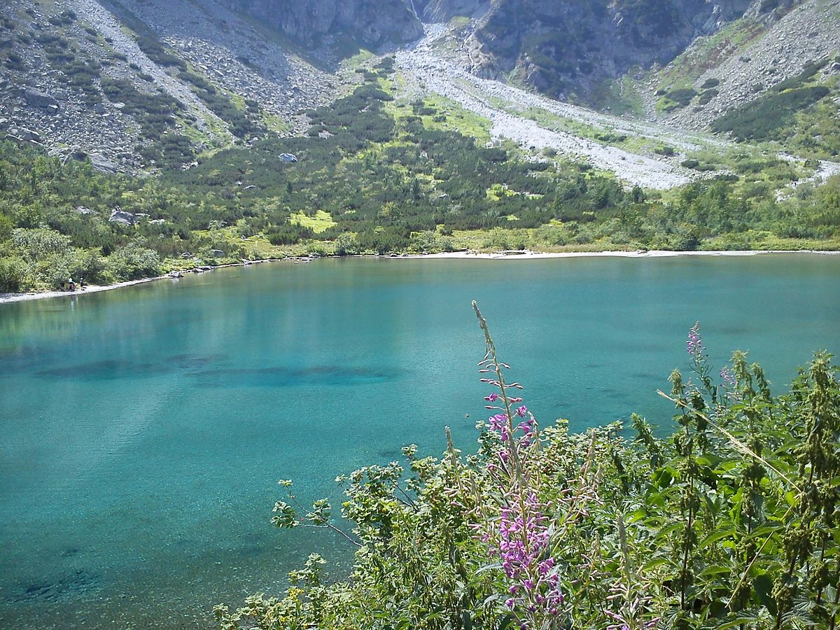 Jakubkova Lúka in Slovakia - a large body of water surrounded by mountains.