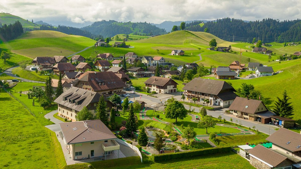 Chuderhüsi – Röthenbach in Switzerland - an aerial view of a village in the swiss alps.