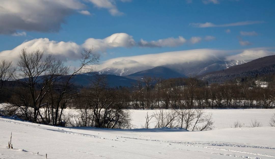 Sugarbush Resort in USA - a snowy landscape with mountains in the background.