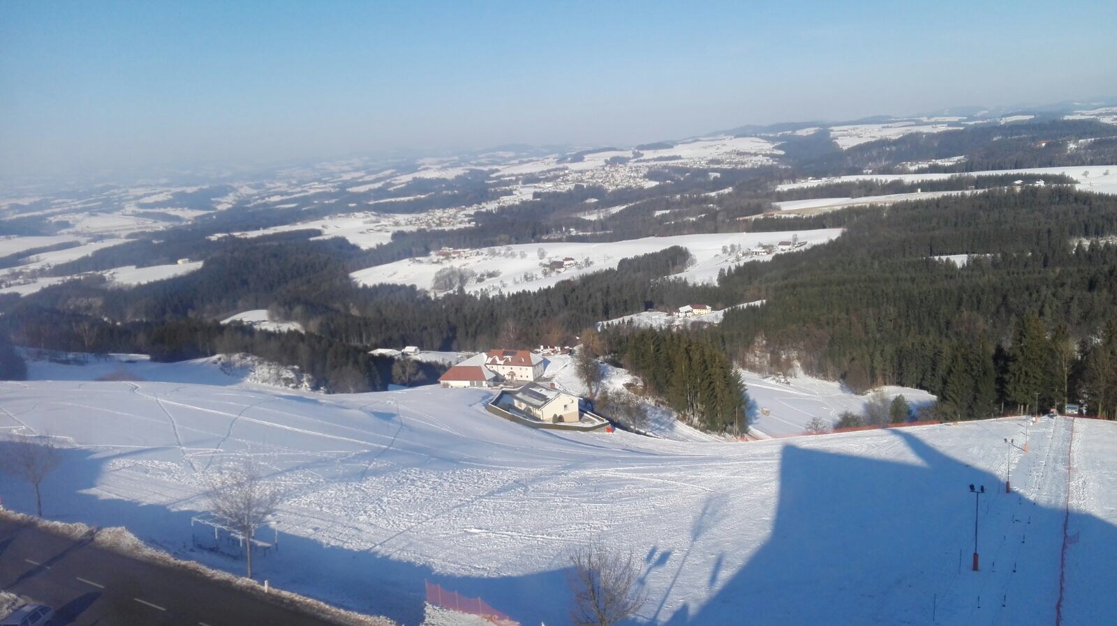 Kronberg – Attergau in Austria - a view from the top of a snowy hill.