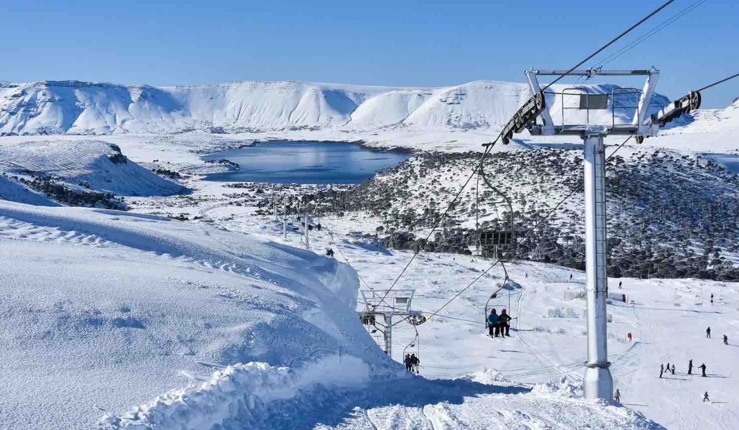 Batea Mahuida in Argentina - a ski lift going up a snowy mountain.