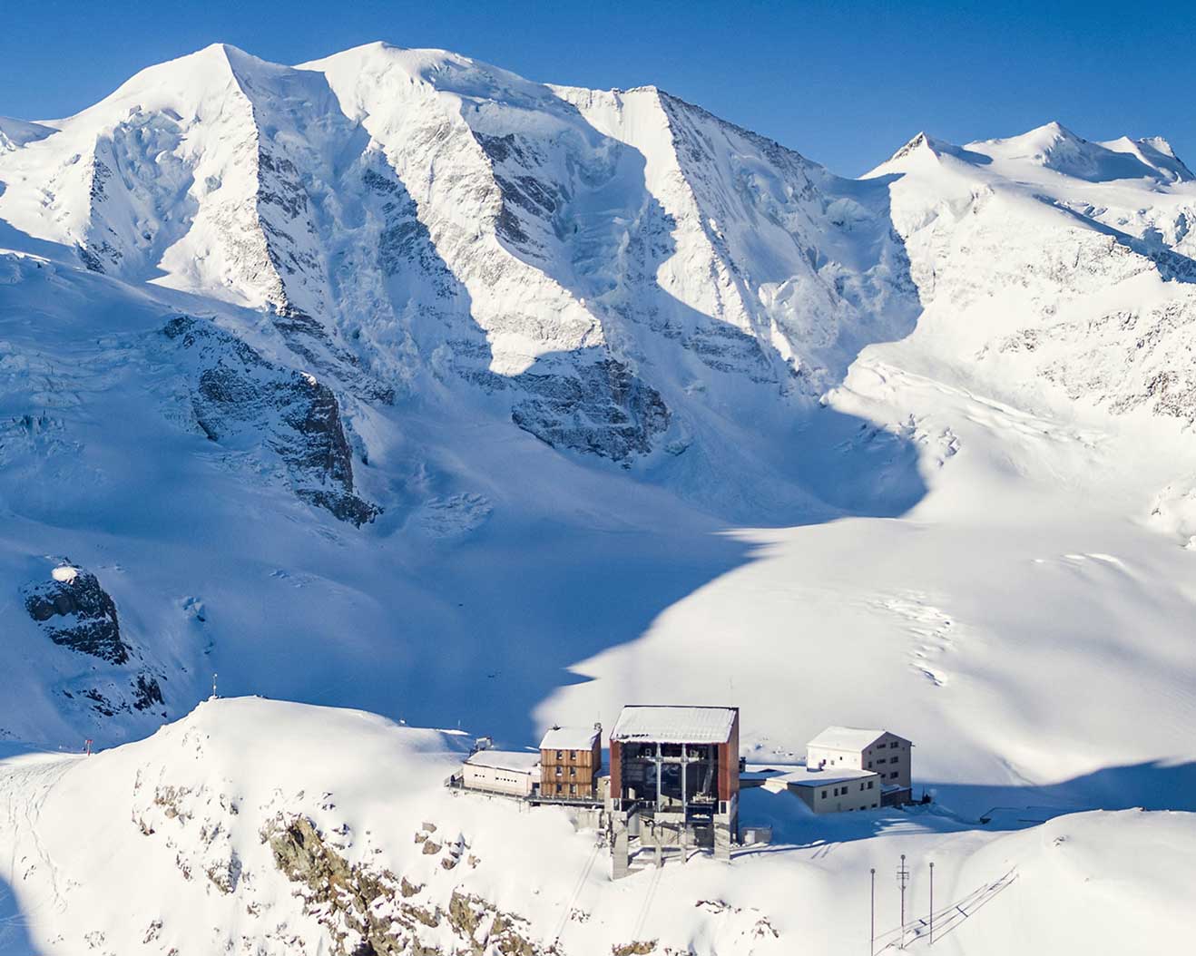Gasse – Ridnaun in Italy - snow covered mountains in the background.
