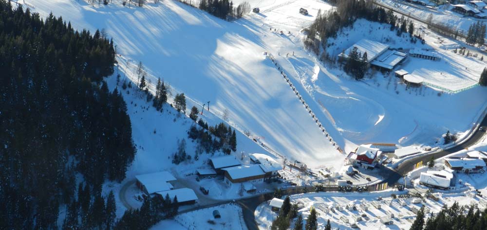 Birkenlift in Austria: aerial view of a ski resort in winter.