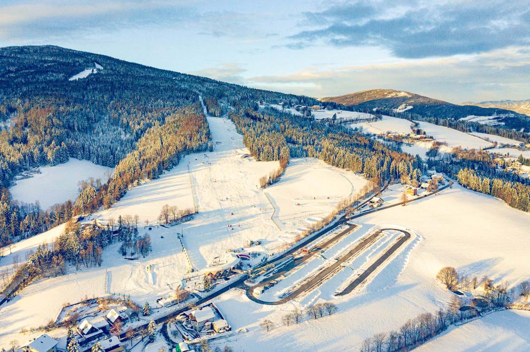 Wexl Arena – St Corona am Wechsel in Austria: an aerial view of the ski resort in winter.
