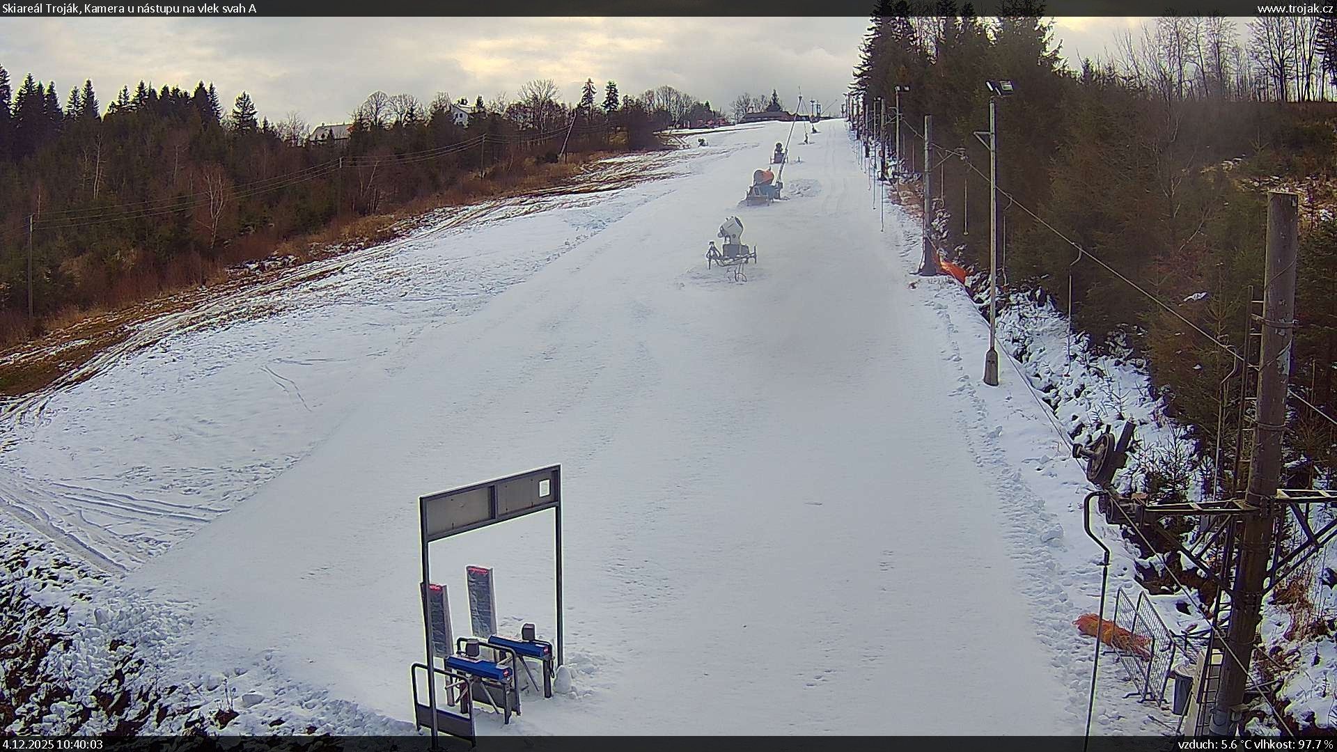 Tesák in Czech Republic - a group of people skiing down a hill.