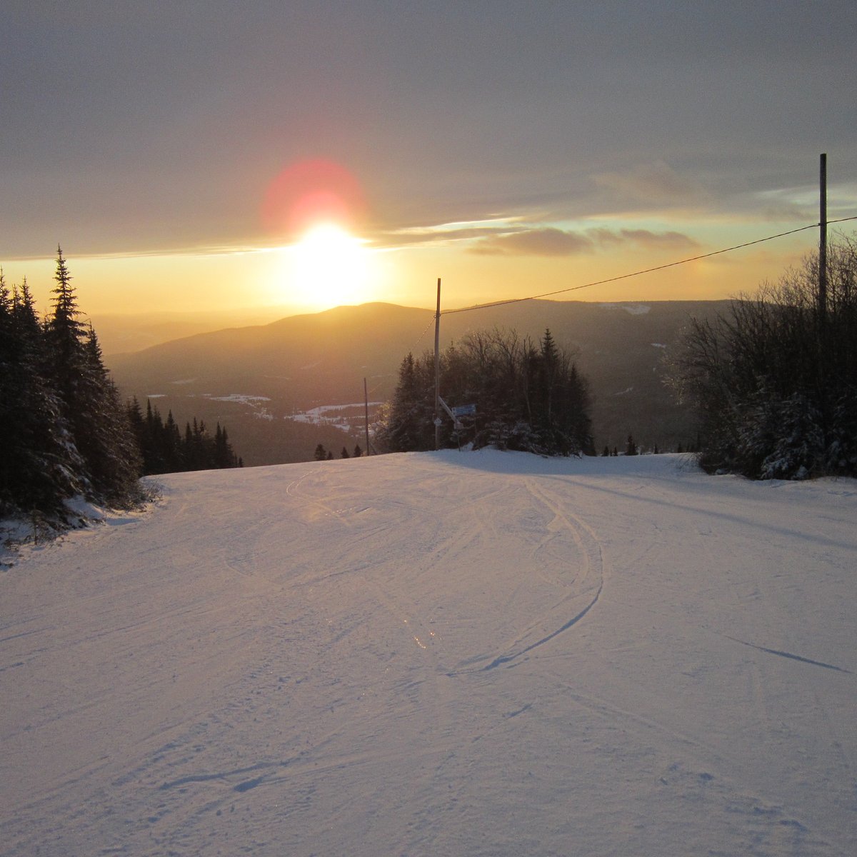 Le Mont Grand-Fonds in Canada - the sun is setting in the sky.