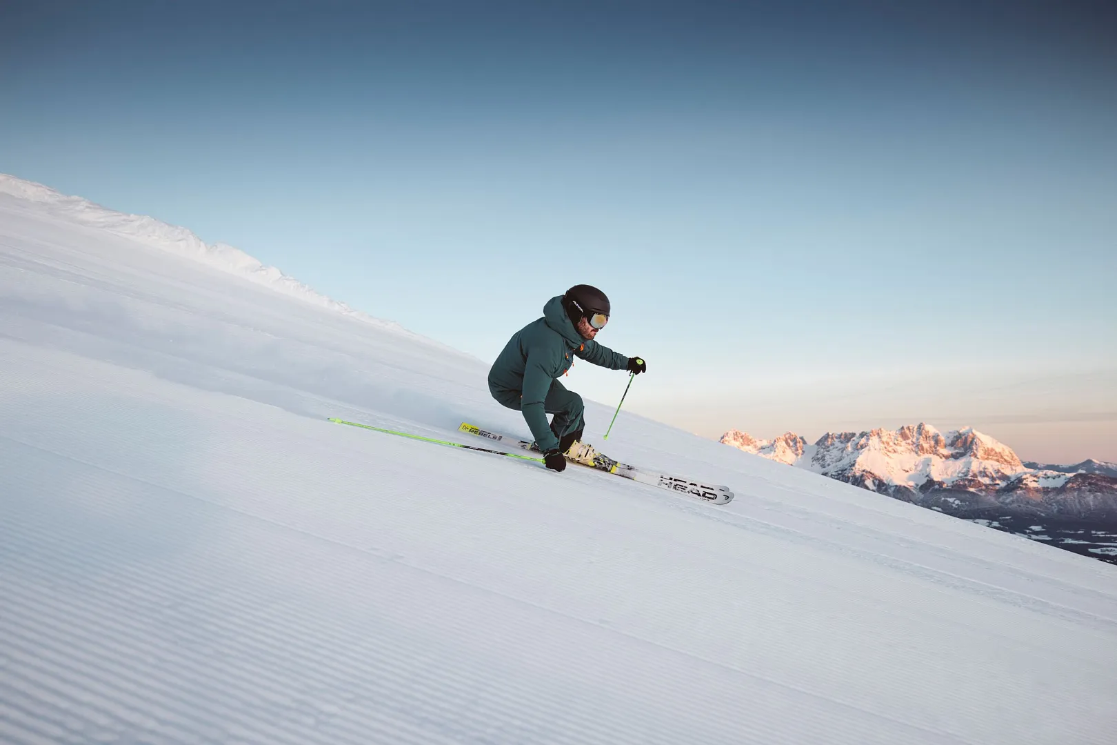 KitzSki in Austria - a man riding skis down a snow covered slope.