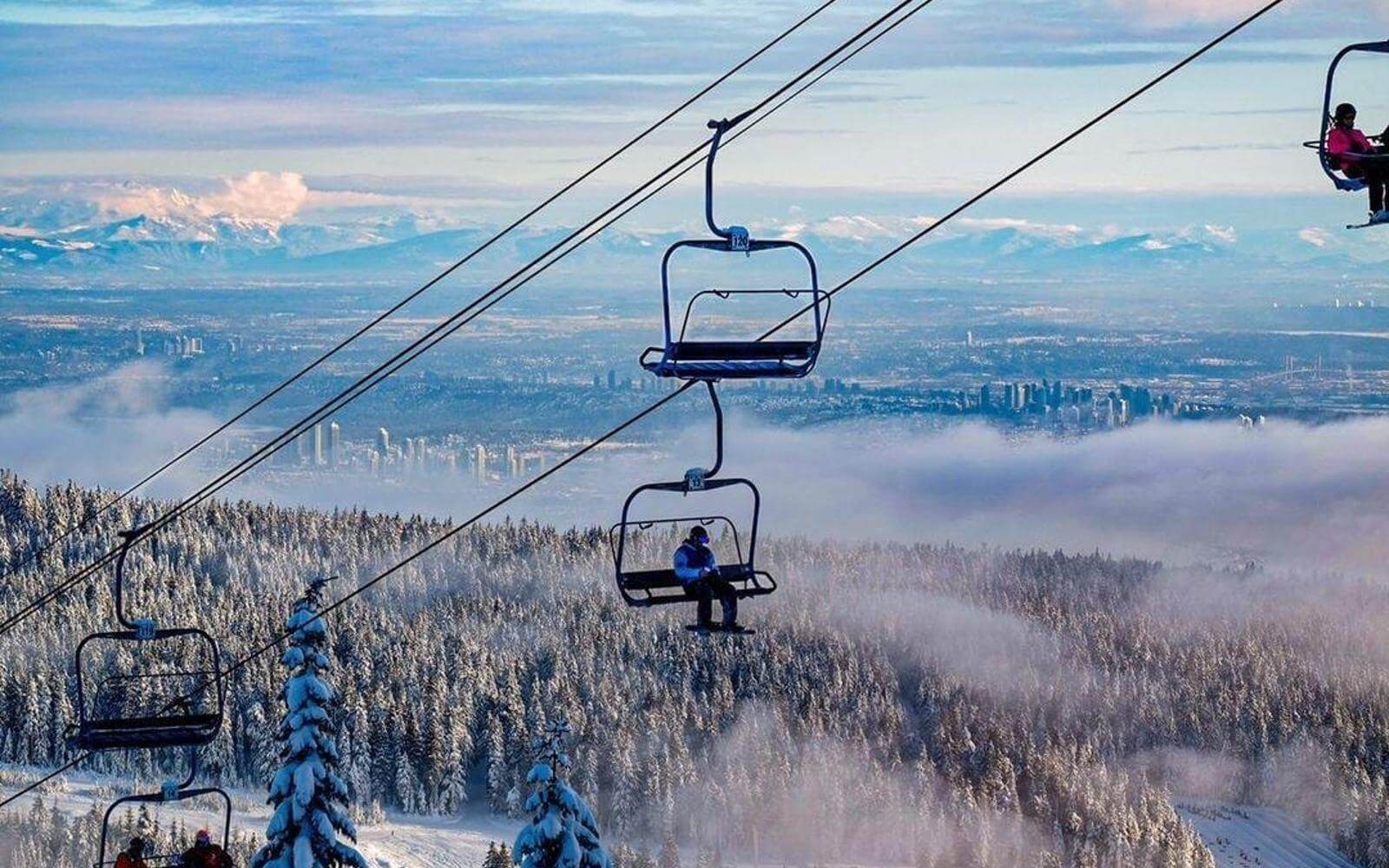Cypress Mountain in Canada - a ski lift going up a snowy mountain.