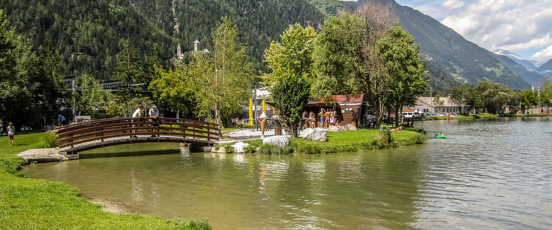 Gais in Switzerland - a small wooden bridge over a body of water.