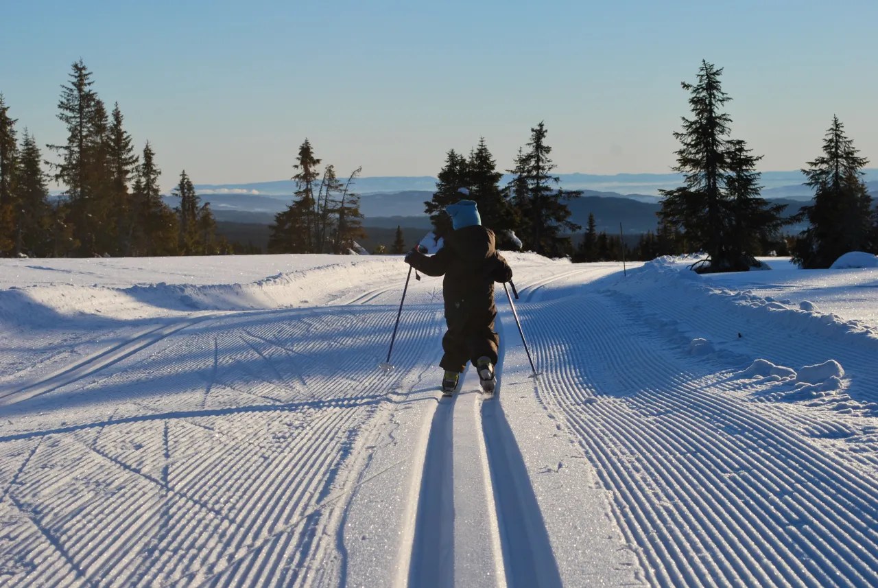 Nordseter Skicenter in Norway - a person walking down a snow covered trail.