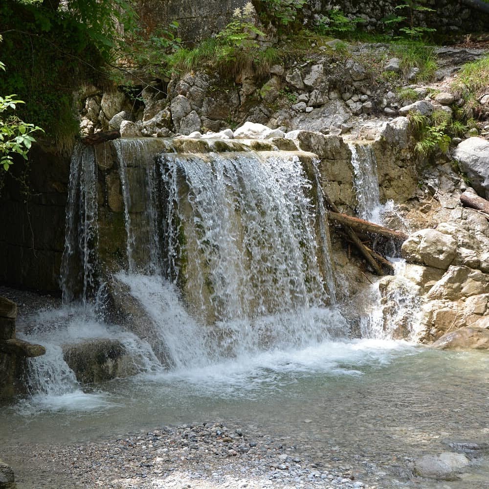 Druckerhof – Unterach am Attersee in Austria - a small waterfall in the woods.