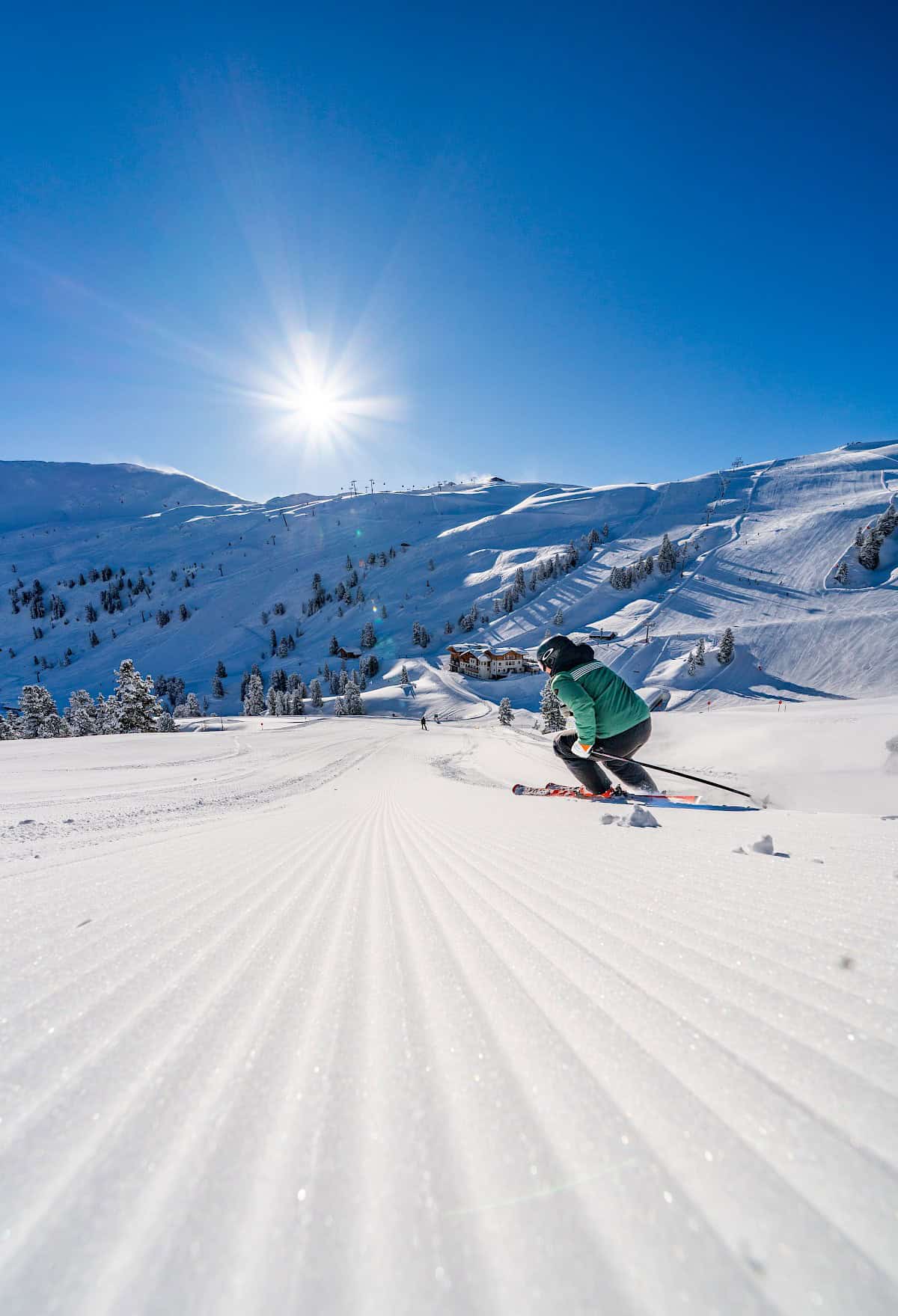 Neukirchen in Germany - a person riding skis down a snowy slope.