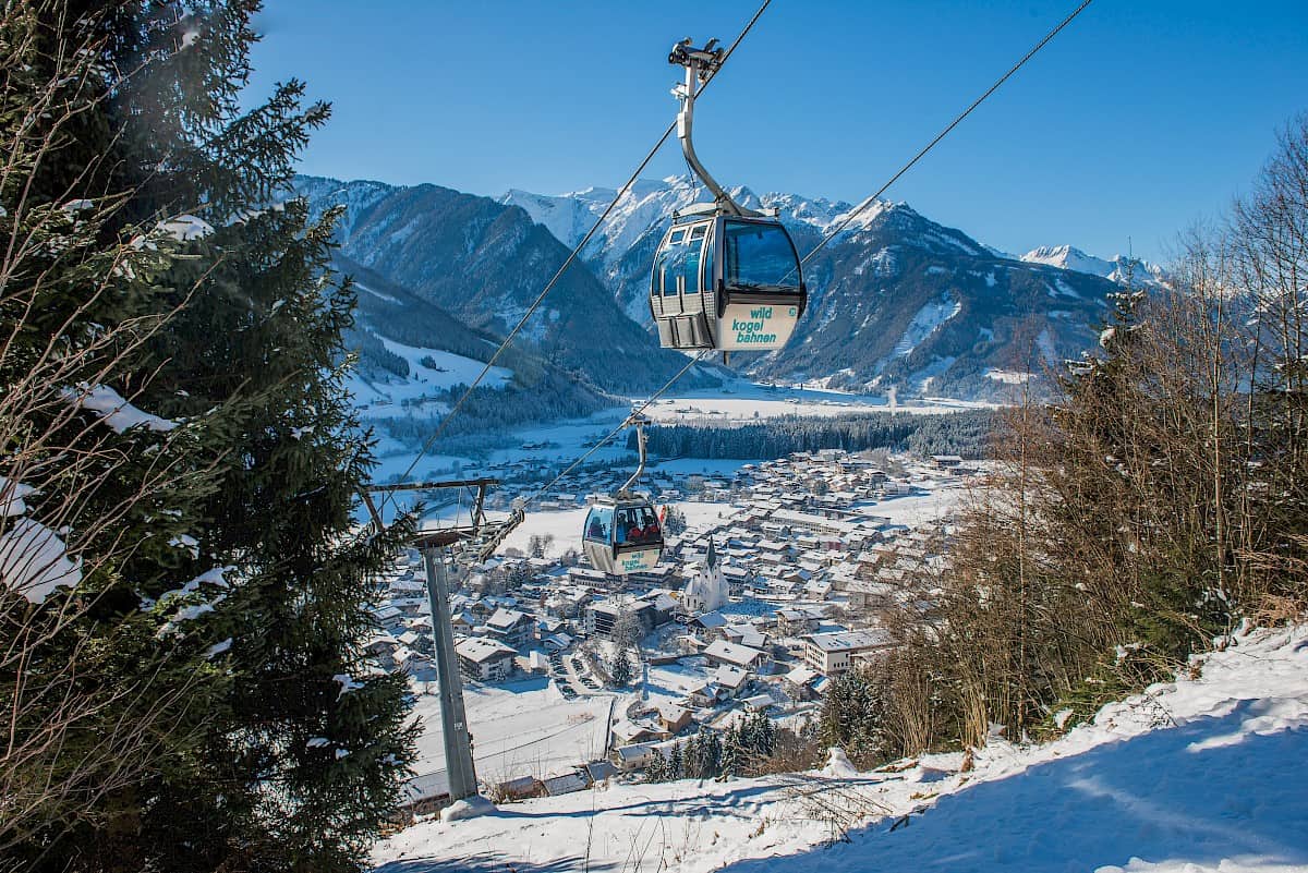 Neukirchen in Germany - a ski lift going up a snowy mountain.