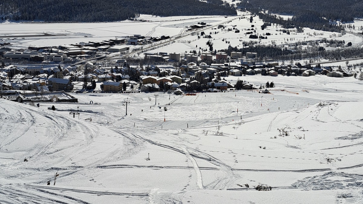 Survih – Samedan in Switzerland: a view of a ski resort in the mountains.